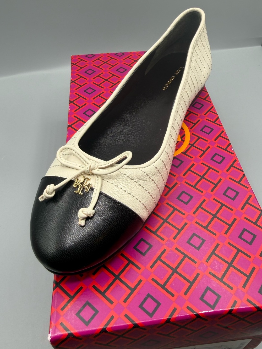 Tory Burch Cream and Black Quilted Cap-Toe Ballet Flat with Bow
